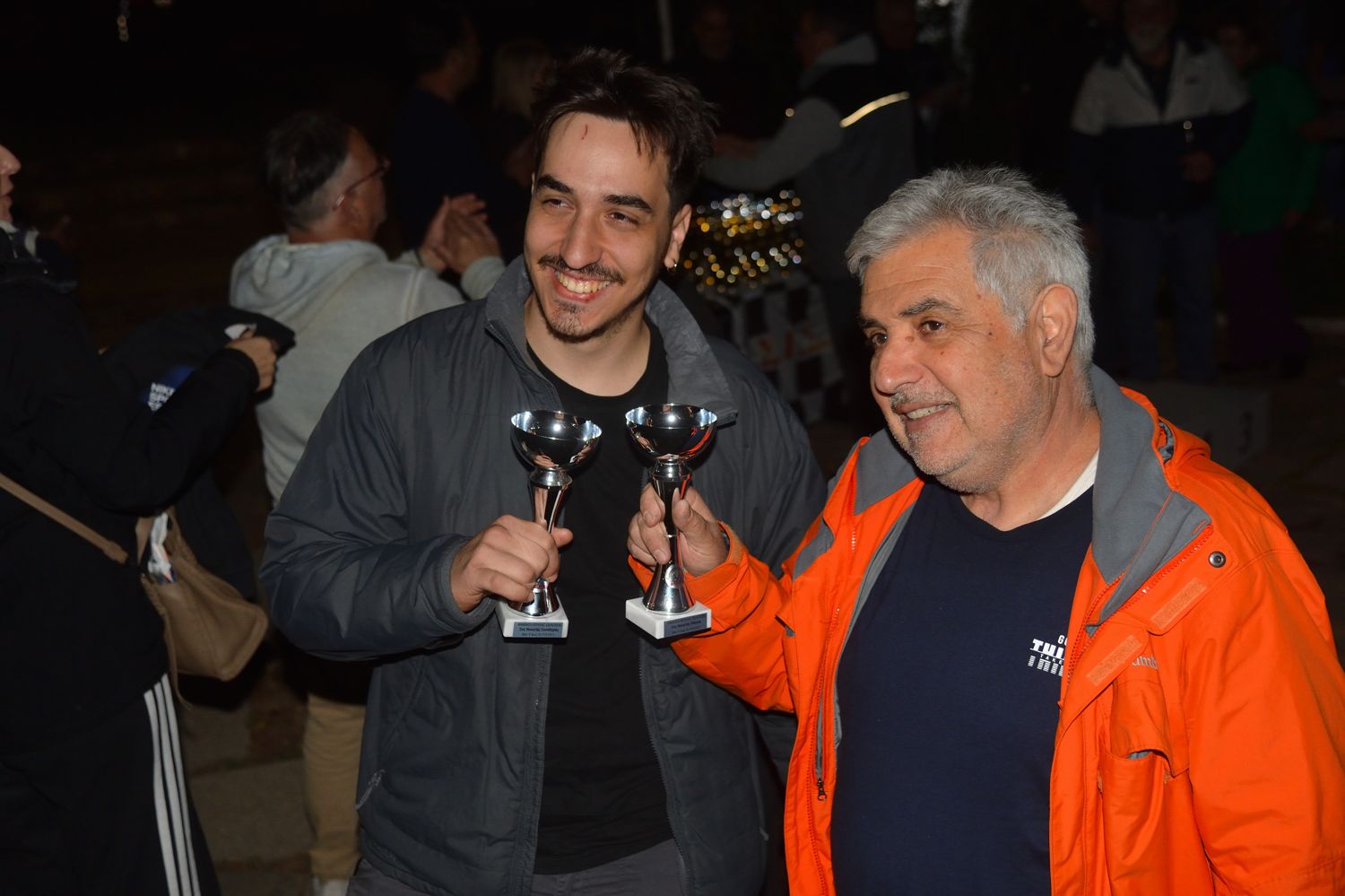 Third place: my father and me at the prize-giving (event photographer)
