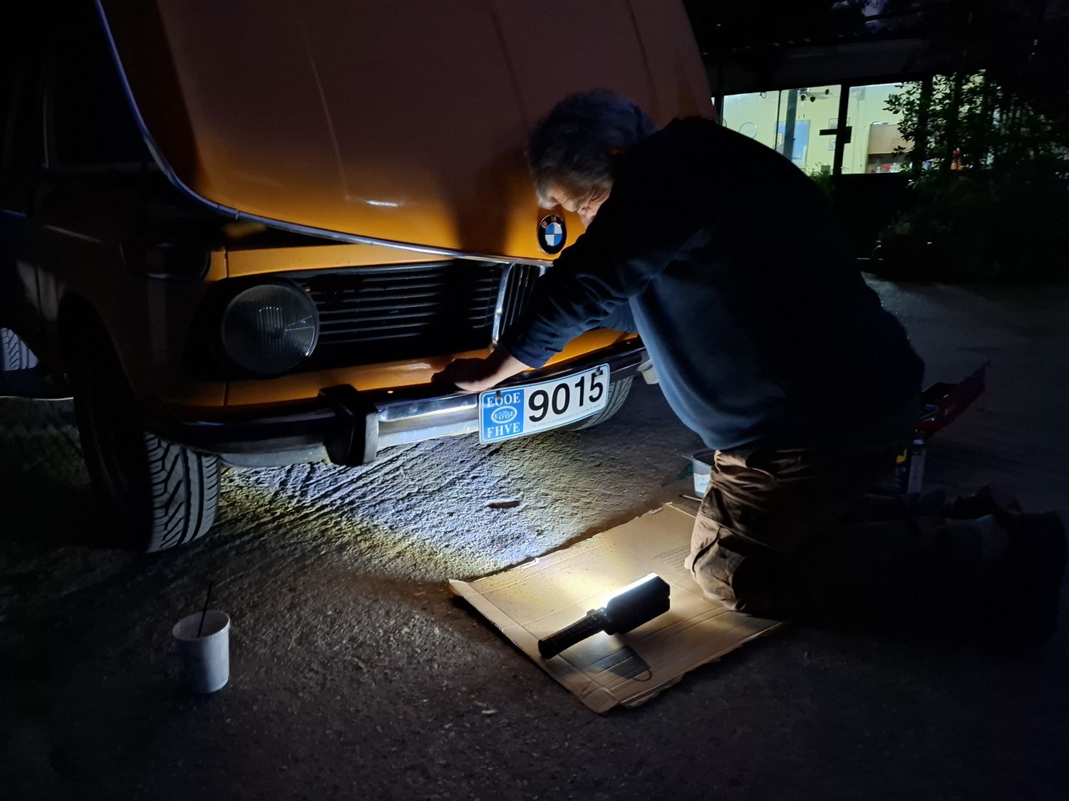 My father fitting the grilles that evening